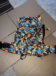 Tula Explore Baby Carrier: “That 70’s” Floral Print. Brand new but missing the manufacturer tag.