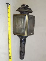 The chimney is rusted off but the remainder of the lantern is in good condition.