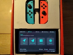 Nintendo Switch OLED au complet, modèle bleu et rouge  Comprend : x1 SD 256Go (Pré-configurer) x1 Nintendo Switch...