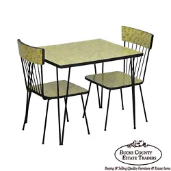 Mid-Century Wrought Iron & Formica Childs Table and 2 Chairs Kitchen Set. Light scratches to table top and chair seat....
