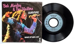 Bob Marley & The Wailers. A1 - Survival (4:00). B1 - Wake Up And Live (5:10). Pochette : VG (Very Good) => Bon État....