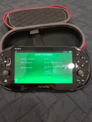 Sony PlayStation Vita Crystal Black Gaming Handheld System.  Immaculate Condition.  Comes with Hard-Shell carrying...