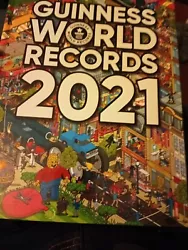Guinness World Records 2021  the book was brand new but it got dropped and it broke the spine. We had to pull book...