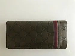 Gucci Embossed Leather Womens Wallet, Khaki. Condition is Pre-owned. Shipped with USPS Priority Mail.