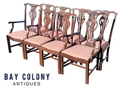 The set of 6 side chairs and 2 arm chairs are in fantastic condition with minimal surface wear and fantastic pink &...