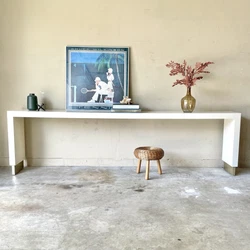 Add a sleek touch to your home decor with this extra-long post-modern console table. Crafted with high-quality formica...