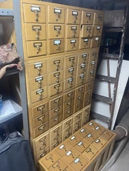 Vintage library card catalog cabinets.