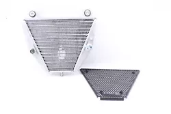 This oil cooler is in very good condition and shows normal signs of wear. The oil cooler has a dent. look closely at...