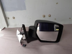 PATRIOT 07-12 (moulded in black), power, non-heated, R. B Grade - The second level quality part. It is of average miles...