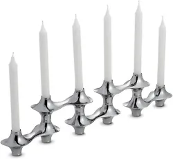 It features six tapered candles glowing on two separate levels atop your dining room table for a romantic evening. This...