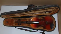 Bow not contemporary with violin. Case stil useable. Has a hairline crack out of one of the f holes Top nut needs...