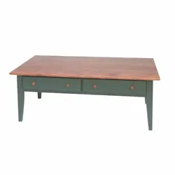 Coffee Table. In contrast to the top the legs and body are hand stained in a Bayberry Green. Features two deep pull-out...
