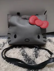 This Loungefly Hello Kitty flannel handbag is a must-have for any Hello Kitty fan. The gray engineered leather exterior...