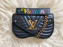 Gorgeous 100% authentic designer Louis Vuitton Small New Wave PM Bag. - Long chain strap that can be worn as a shoulder...