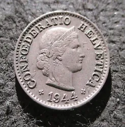 5 RAPPEN 1944 - WORLD WAR II. This coin was minted in 1944 in Bern, Switzerland. OLD COINS OF SWITZERLAND.