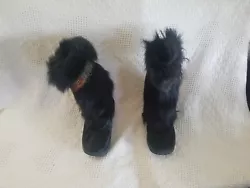 COWHAIR and feather BEARPAW womens boots size 7  pre owned good condition...see photographs
