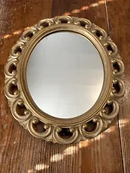 Vintage syroco wood oval gold ornate wood framed mirror 14x12 easel back. This is a pre-owned item and may show normal...