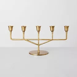•Antiqued metal taper candelabra •Metal construction with brass finish •Staggered heights for an elevated look...
