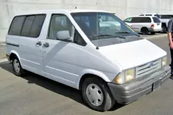 1997 Ford Aerostar XLT 7-passenger minivan. 108555 miles. Started with a jump, idled, moved forward and back. A/C...