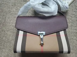 Up for sale is a stylish and trendy crossbody bag from the renowned brand Burberry. This bag is perfect for women who...