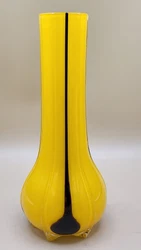It is sort of bulbous at the bottom. 8” tall and 3.25” wide at the widest part. I do not know the origin but it is...