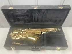 This is a used The Woodwind tenor saxophone in good playing condition. There is wear from normal usage throughout....