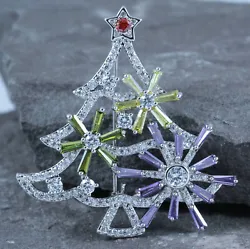 This gorgeous brooch is made with AAA grade Clear Lilac, Yellow, Olive Green and Light Red CZ stones set on shiny...