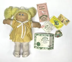 Cabbage Patch Doll 1978 1982 Blond Hair Yellow Dress W/ Birth Certificate Etc. Vintage Doll with insert cards.Small...