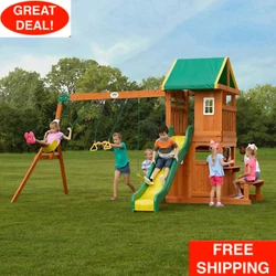 2 belt swings and trapeze bar. Down below there is another fort, with front wall, window, and real door! And the side...