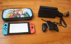 Nintendo Switch 32GB Console with Red/Neon Blue Joy-cons in good working order. NO PRICE RESERVE.