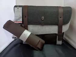 Six bags available. This bag boasts a slide closure and a magnetic feature, and is crafted with leather handle/strap...