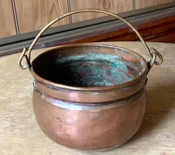 Old repairs apparent in photos. No makers marks.