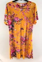 Size: 3XL, 3 Extra Large. with Pink Floral Design. Short Sleeves Round Neck. Easy Pullover Style. Condition: Excellent....