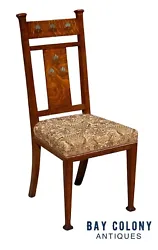 The chair is crafted from bold grain Tiger Oak and is finished in a warm golden brown color. We couldn’t locate any...