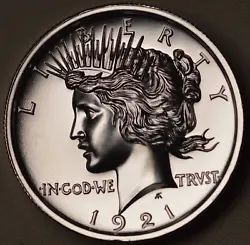 LIBERTY is above, while IN GOD WE TRUST and the date are below. High Relief. Contains 1 Troy Ounce. 999 Fine Silver.