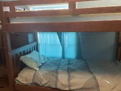 twin over twin bunk bed with stairs.