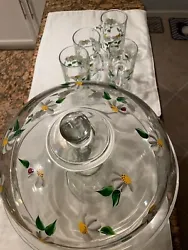 glass cake stand plate daisies and ladybugs with cups.