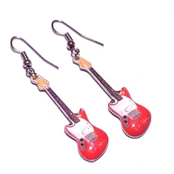 COLLECTION LÉGENDES MUSICALES Magnifique paire de boucles doreilles, inspirée de la guitare jouée par le légendaire...