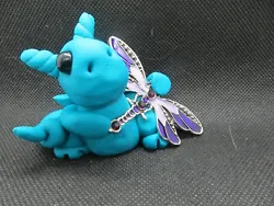What a pretty combo--his color and the purple of the dragonfly! They are made for mature children to adults. They are...
