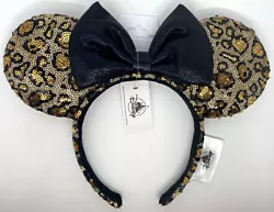 Minnie Mouse ears with black bow and sequin animal print ears. Disney Parks. Ears Headband. Animal Kingdom. FREE...