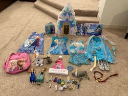 Beautiful collection of over 40 Disney Frozen Items.  All items are in Excellent Condition.  Set cost over $400...
