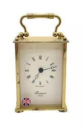 Heavy Brass Quartz Carriage Clock by Rapport of London in working condition however the clock case has corrosion please...
