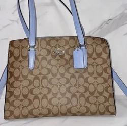 Coach Tatum Carryall in Signature Canvas CrossbodyThis Coach Tatum Carryall in Signature Canvas Crossbody has been...
