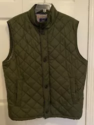 Army green quilted vest.
