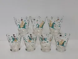 Each glass is adorned with a unique Persian polo riders pattern in gold and aqua, making it an elegant addition to your...
