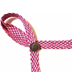 Fold Over Braid Trim. Pattern: Knitted Weave. Colors: White, Red and Pink. 100% Acrylic.