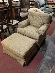 This is a green and gold paisley upholstered chair with matching ottoman by Temple Furniture. It is in very good...