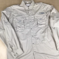 This Columbia PFG Omni-Shade Bahama II shirt is perfect for any fishing or boating excursion. It is made of a polyester...