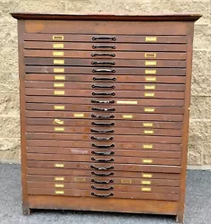 ANTIQUE 22 DRAWER. WOODEN MAP CABINET. All of the pulls are there. Looks to be made mostly of pine and fir.