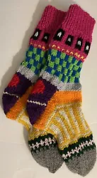 One pair of HOMEMADE HAND KNIT MULTI COLORED SOCKS with HEART ON HEEL Woman Size 7-8 1/2. The socks measure 10...